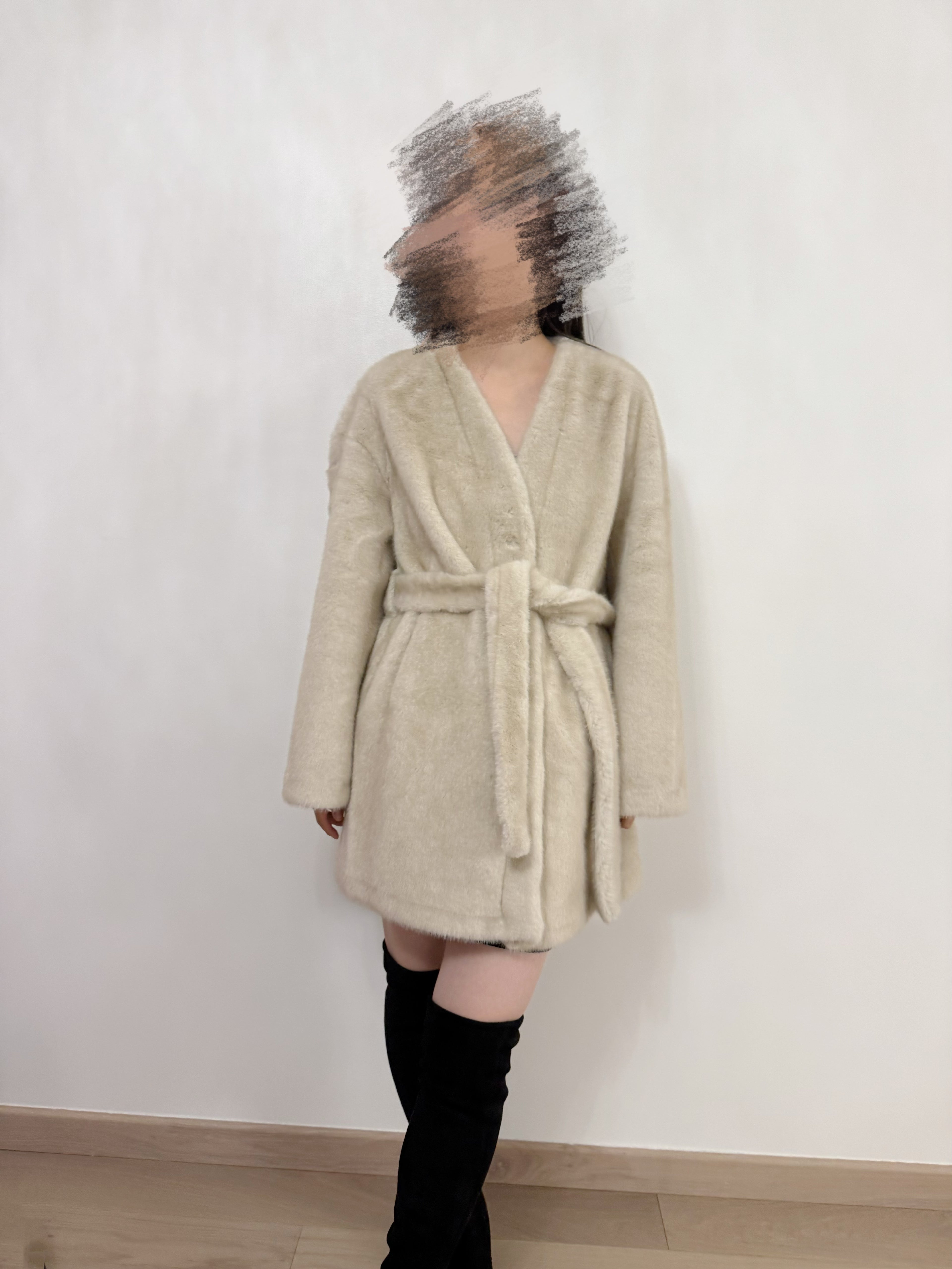 Manteau en fausse fourrure à ceinture