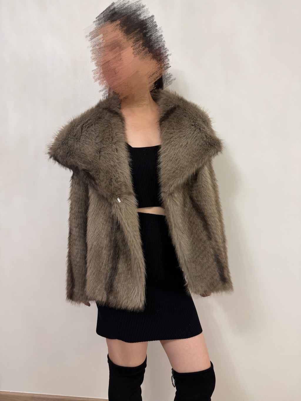 Veste courte en fausse fourrure