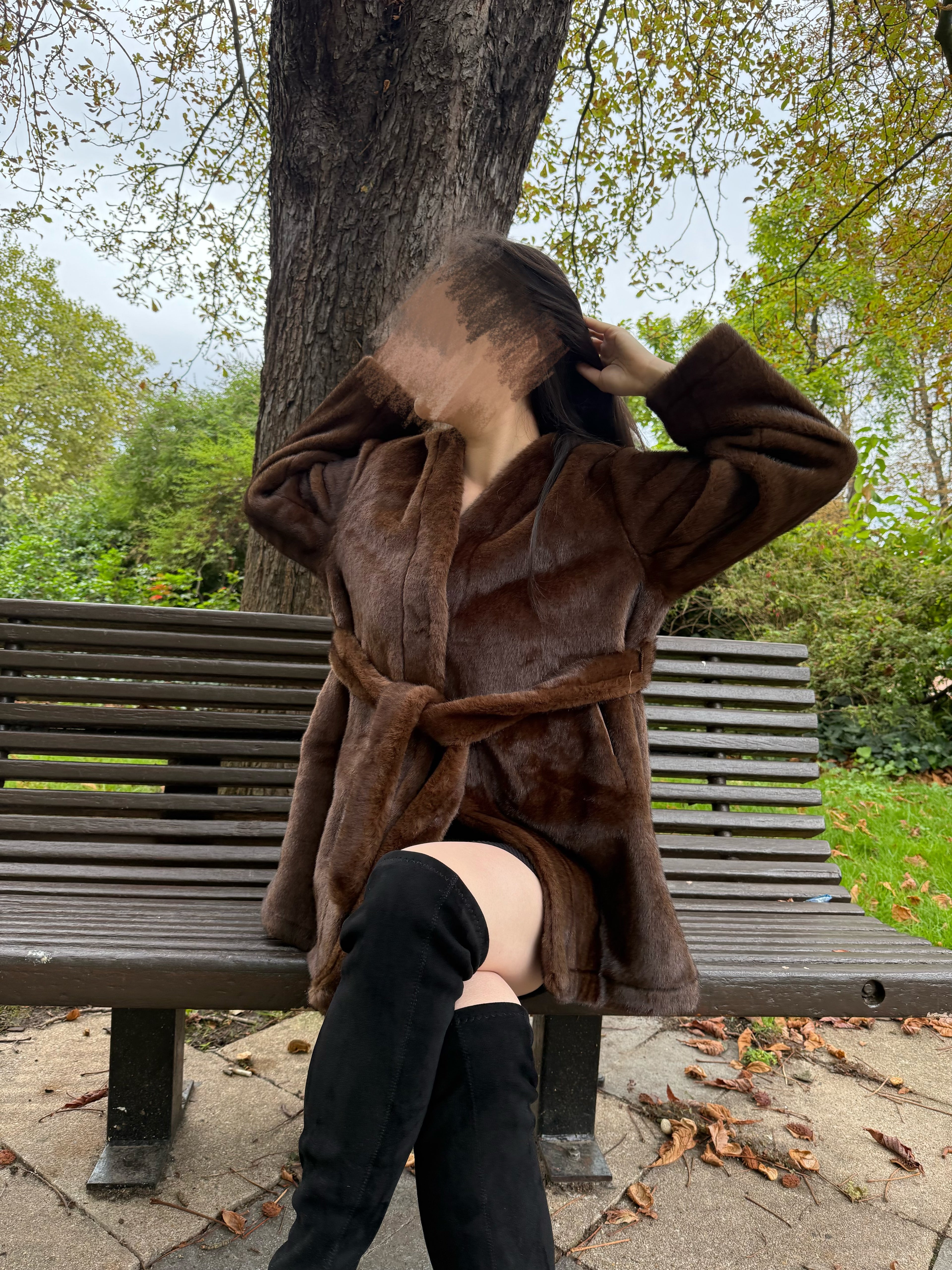 Manteau en fausse fourrure à ceinture
