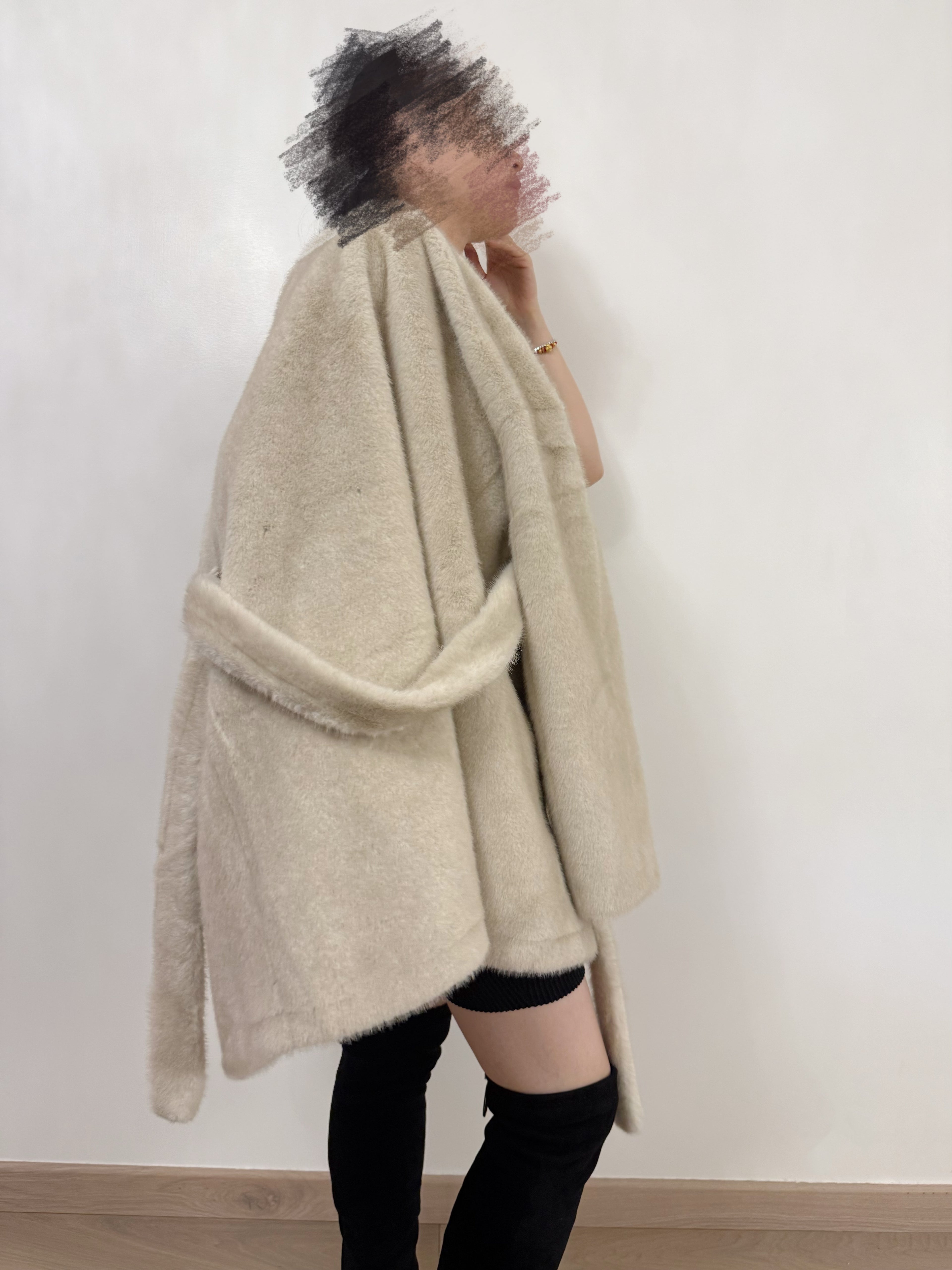 Manteau en fausse fourrure à ceinture