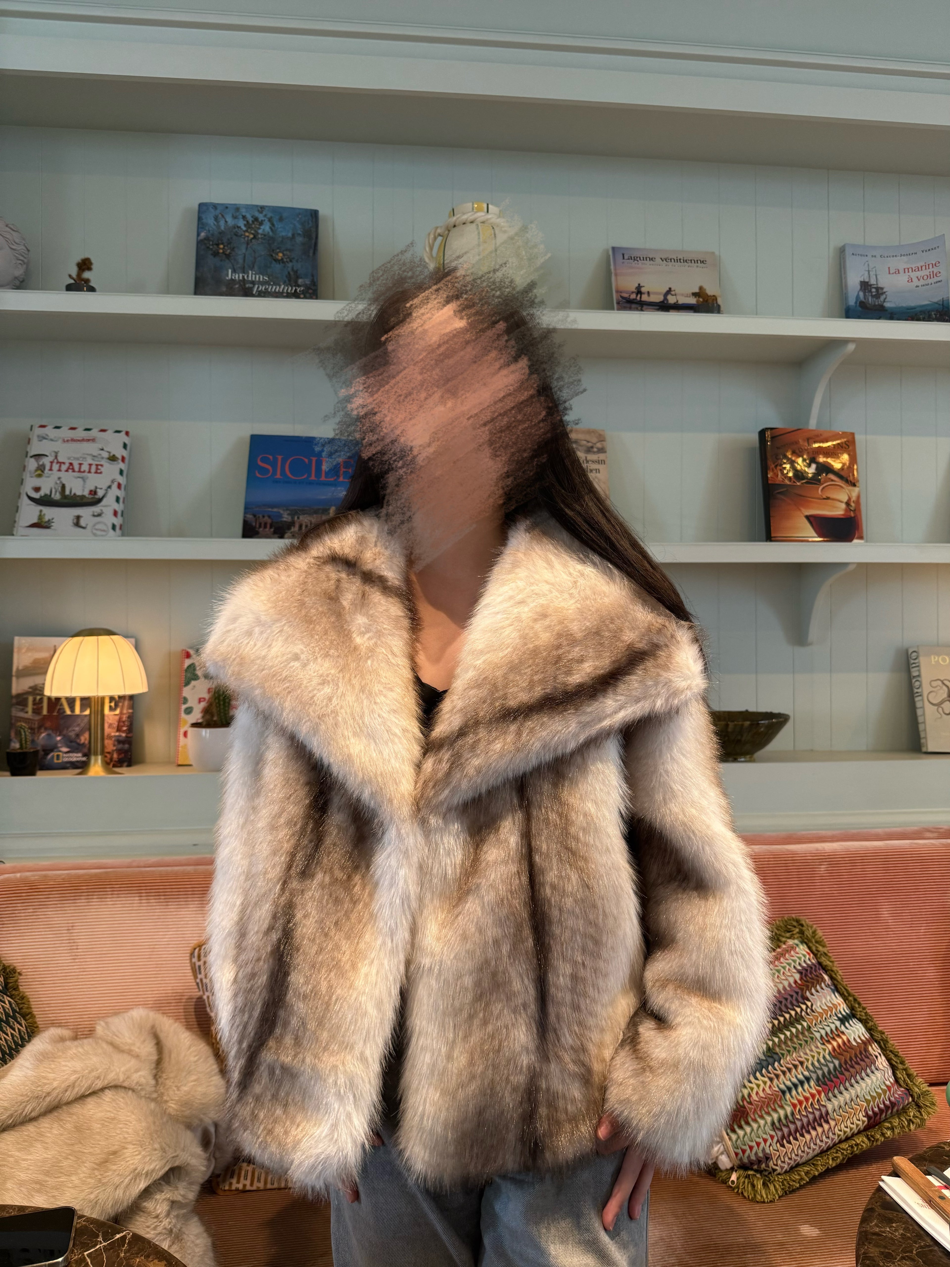 Manteau en fausse fourrure